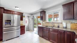 Spacious Home with King Beds, Large Yard, & Family Space - Image 5