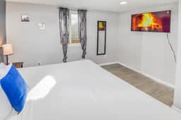 Cozy basement space with 2 bedrooms and kitchenette - Image 3