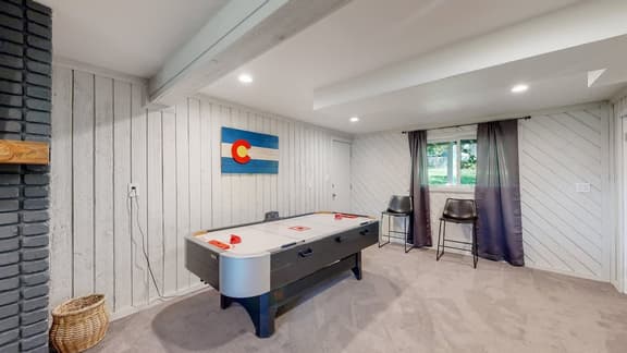 Cozy Four Bedroom Family Retreat with Yard and Air Hockey - Image 1